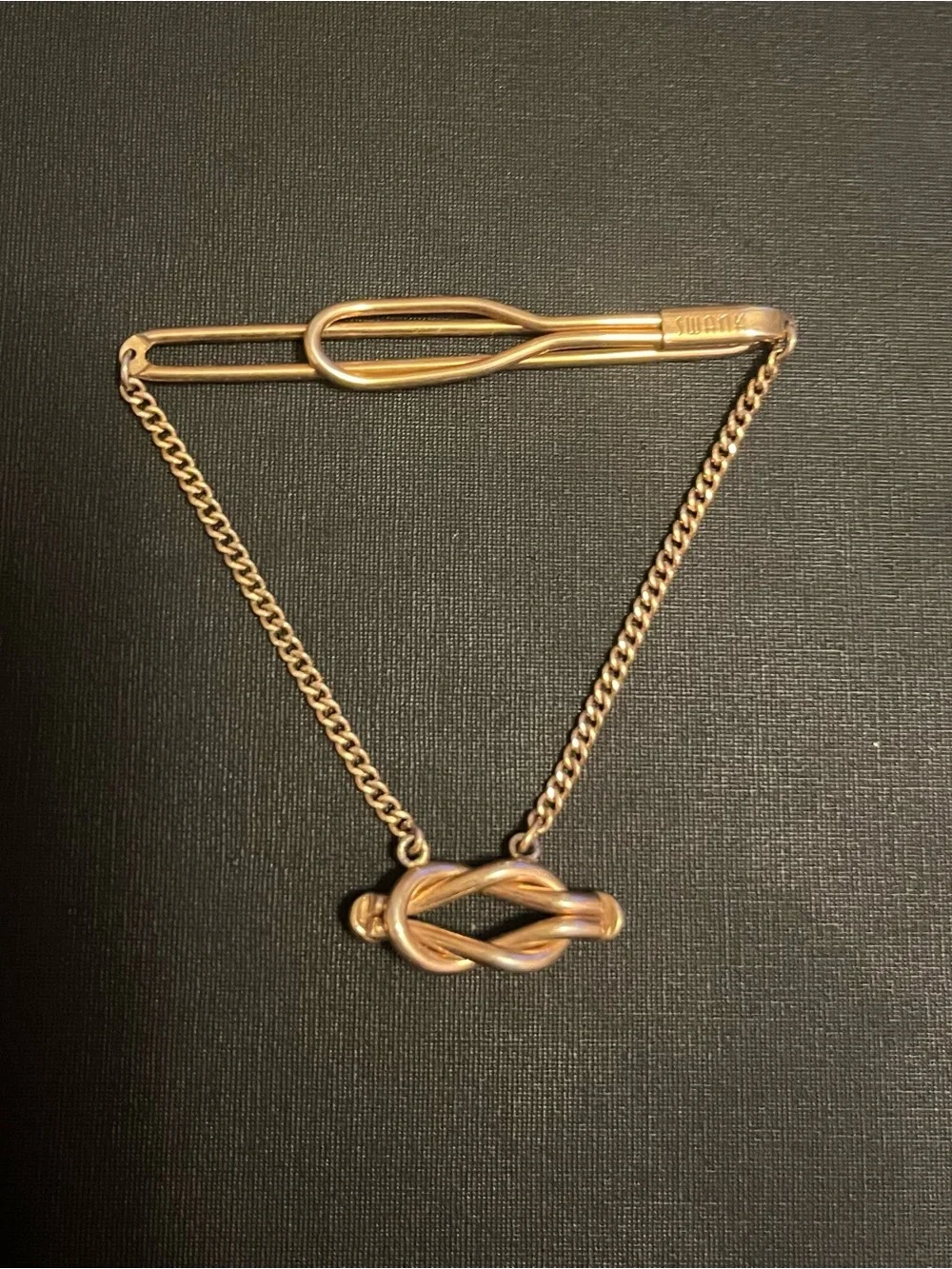 Vintage Swank gold ruby tie bar clip cuff links set